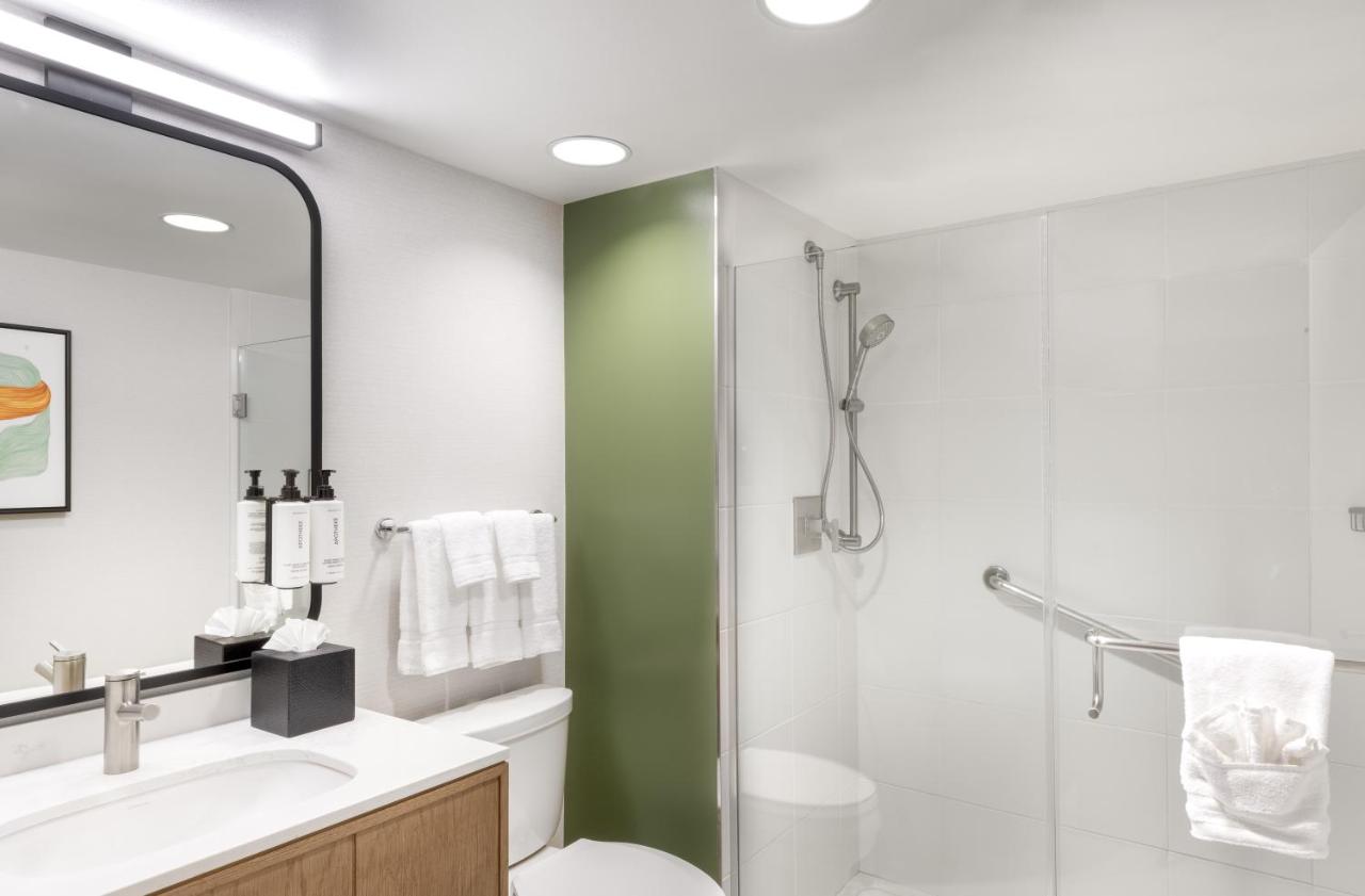 Premium Queen Room with Two Queen Beds and Moility Accessible Roll-In Shower at voco Chicago Downtown - Riverwalk by IHG