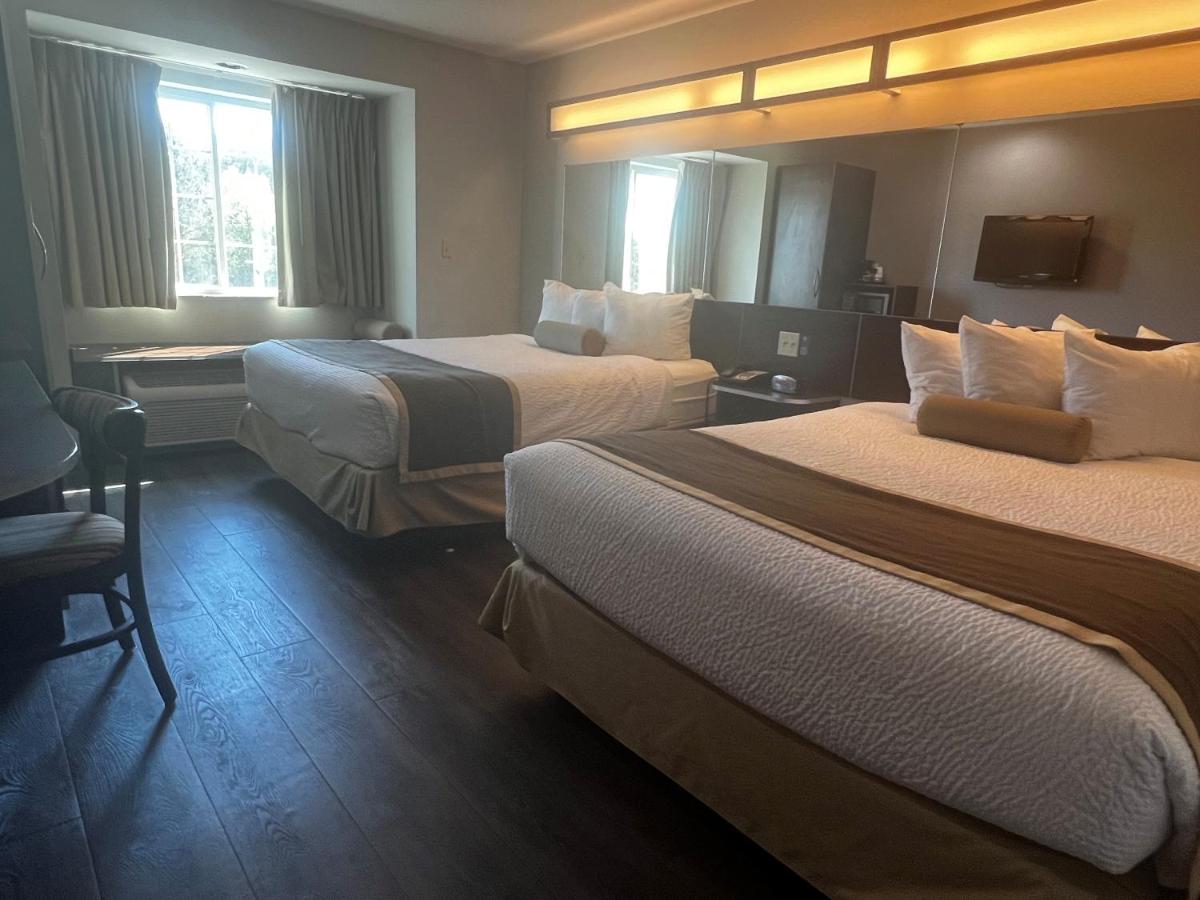 Queen Room with Two Queen Beds - Non-Smoking at Microtel Inn & Suites by Wyndham Pearl River/Slidell