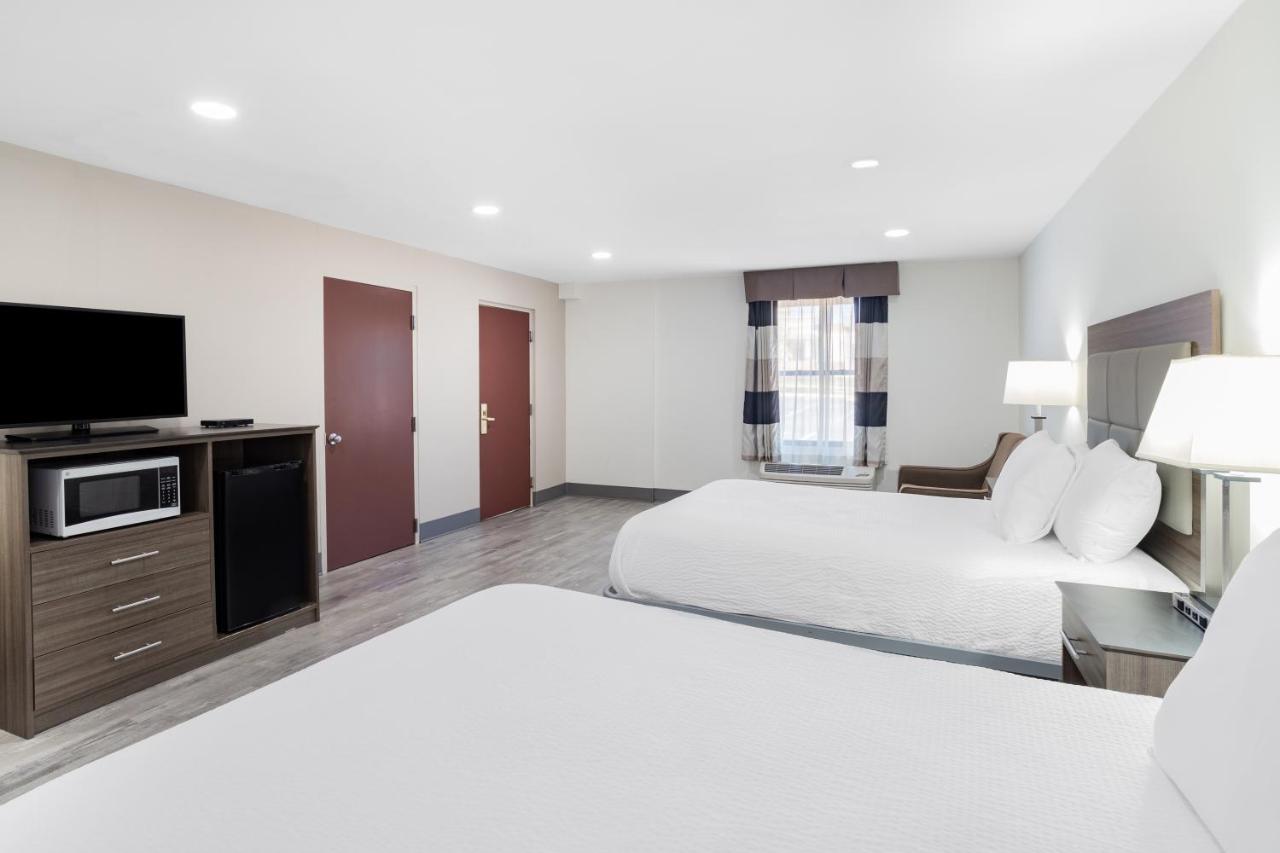 2 Queen Beds, 1 Sofa Bed, Deluxe Suite, Non-Smoking at Ramada by Wyndham Hendersonville