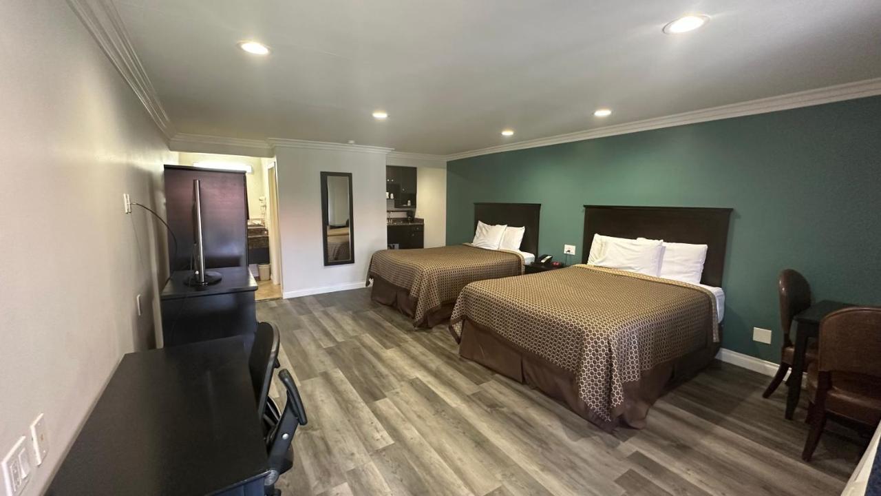 Deluxe Queen Room with Two Queen Beds at Garden Inn & Suites