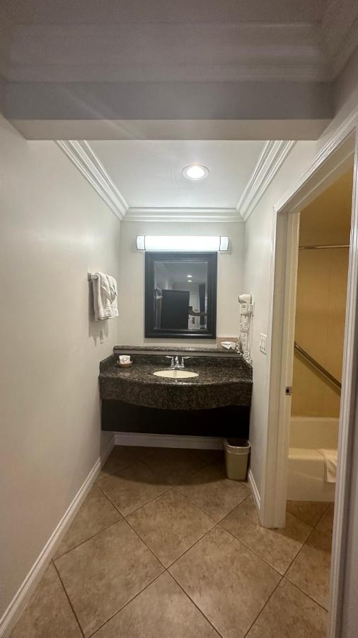 Deluxe Queen Room with Two Queen Beds at Garden Inn & Suites