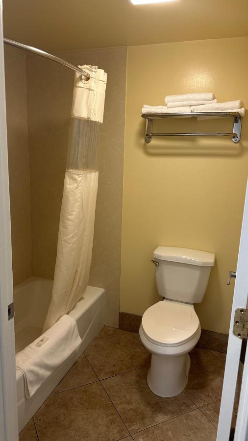 Deluxe Queen Room with Two Queen Beds at Garden Inn & Suites