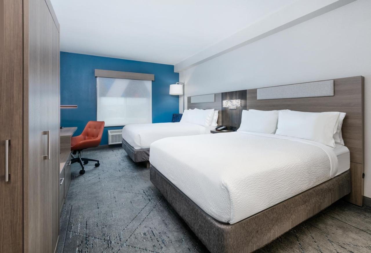 Queen Room with Two Queen Beds Hearing Accessible Bathtub - Non-Smoking at Holiday Inn Express & Suites Dallas Park Central Northeast, an IHG Hotel
