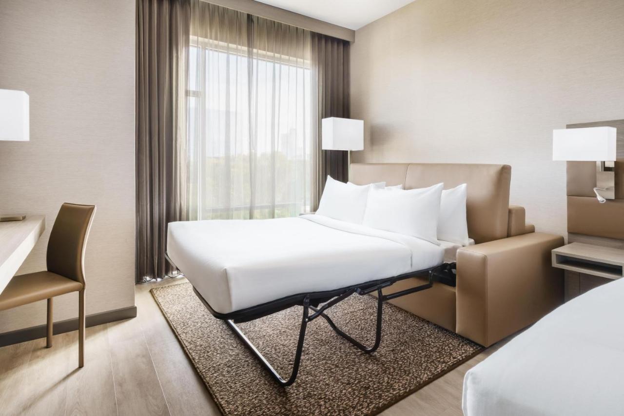 Standard King Room with Sofa Bed and City View at AC Hotel by Marriott Raleigh Downtown