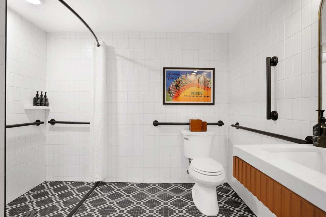 Queen Room with Two Queen Beds and Mobility Accessible Roll-In Shower at Hotel Indigo Minneapolis Downtown by IHG