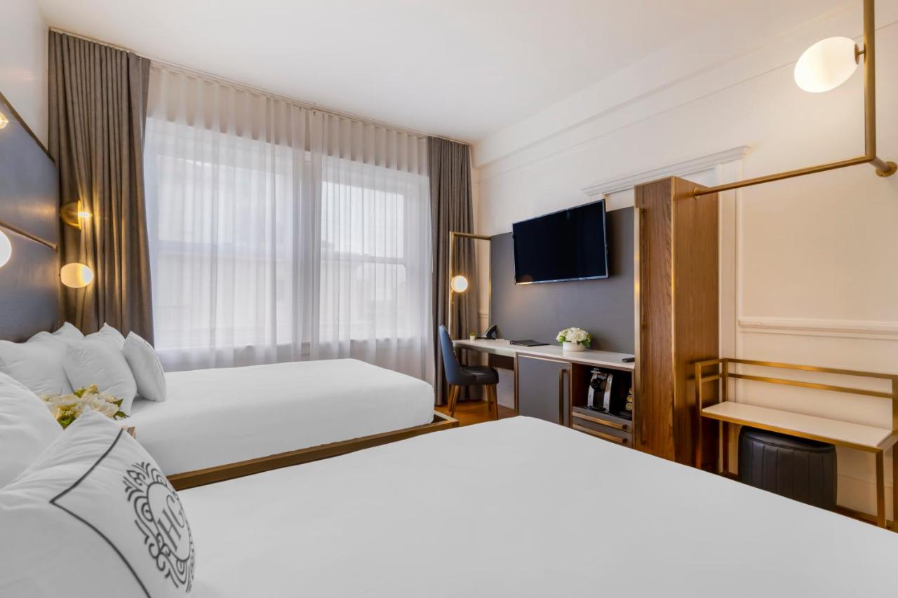 Queen Room with Two Queen Beds at Hotel Gibbs Downtown Riverwalk