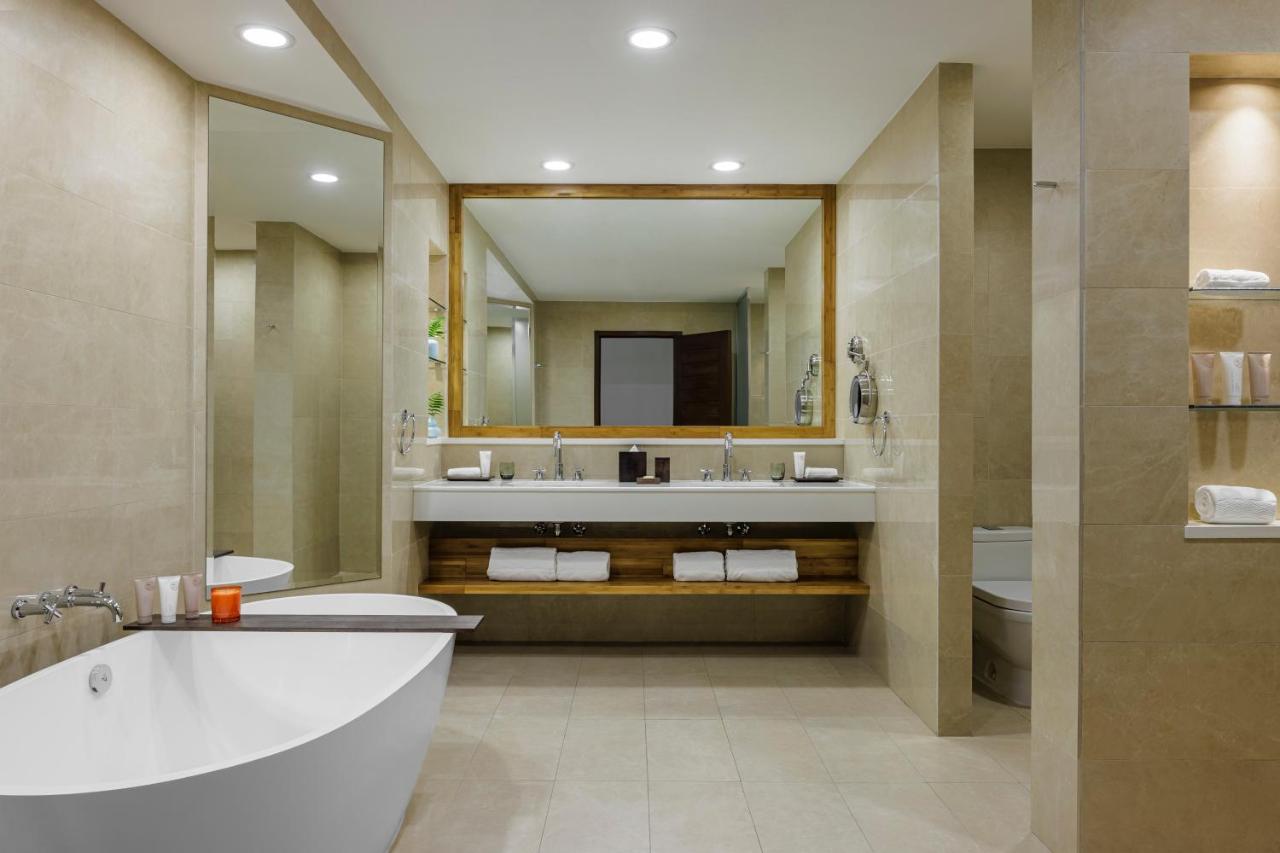 Oceanfront Junior Suite with 2 Double Beds at Aurora Anguilla Resort & Golf Club
