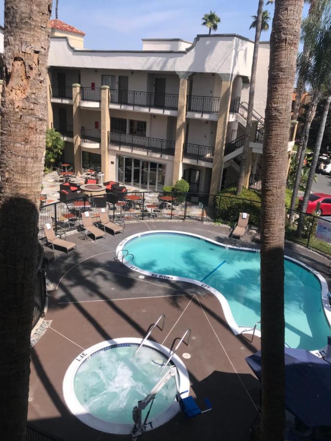Queen Room with Two Queen Beds and Roll-In Shower - Accessible/Non-Smoking at Comfort Inn & Suites Orange County John Wayne Airport
