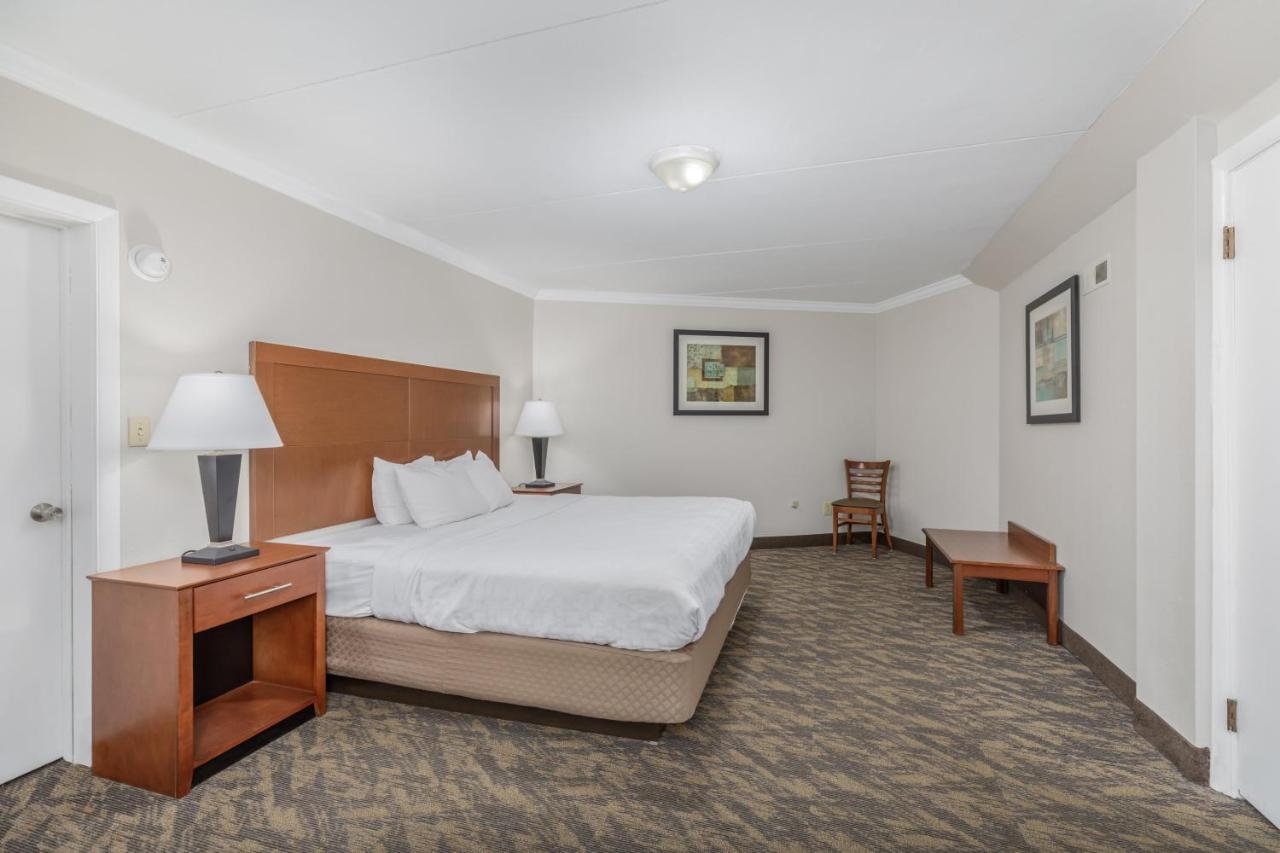 King Suite with seasonal fireplace at Crossroads Inn & Suites