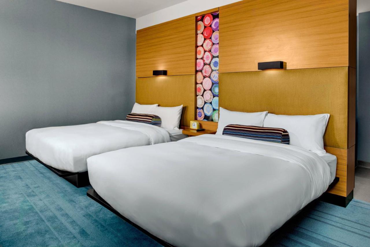 Queen Room with Two Queen Beds and Roll-in Shower - Mobility and Hearing Accessible at Aloft by Marriott Chapel Hill