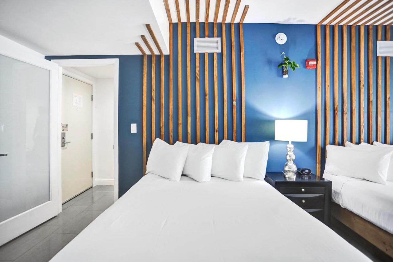 Premium Two-Bedroom Suite Courtyard View with Kitchen at Hotel Belleza