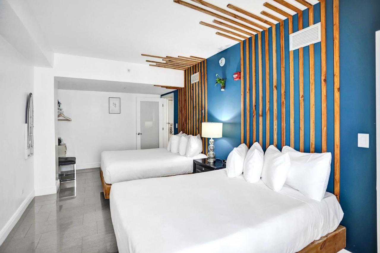 Premium Two-Bedroom Suite Courtyard View with Kitchen at Hotel Belleza