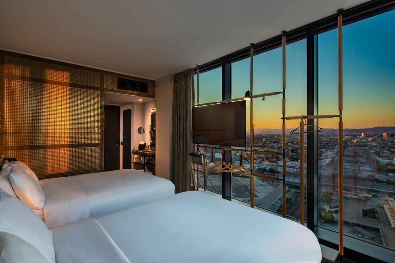 Corner Queen Room with City View at Moxy Downtown Los Angeles