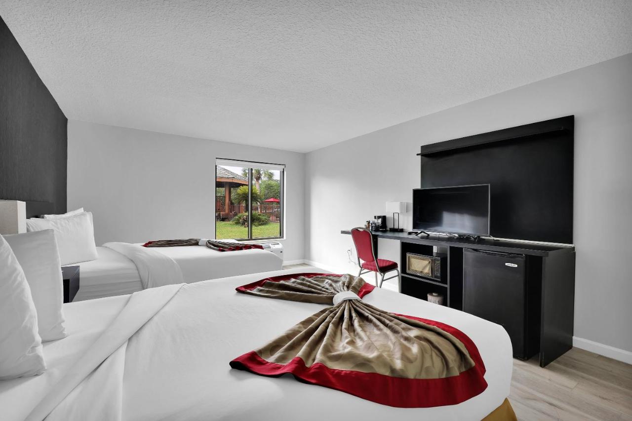 Deluxe Queen Room with Two Queen Beds - Non-Smoking at Ramada by Wyndham Jacksonville I-95 by Butler Blvd