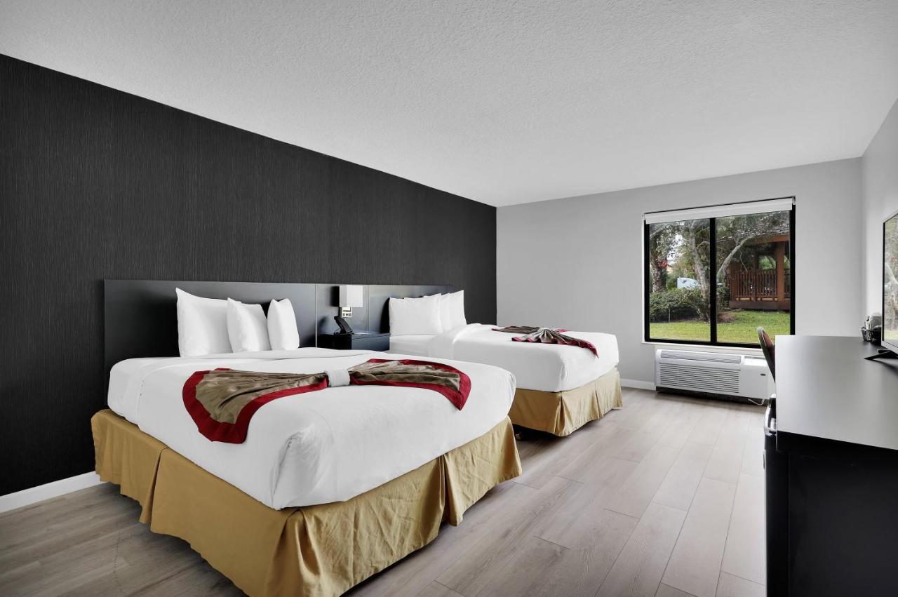 Deluxe Queen Room with Two Queen Beds - Non-Smoking at Ramada by Wyndham Jacksonville I-95 by Butler Blvd