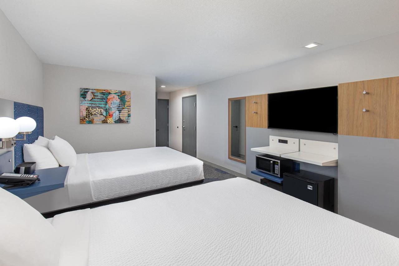 Queen Room with Two Queen Beds - Non-Smoking at Microtel Inn & Suites by Wyndham Manchester