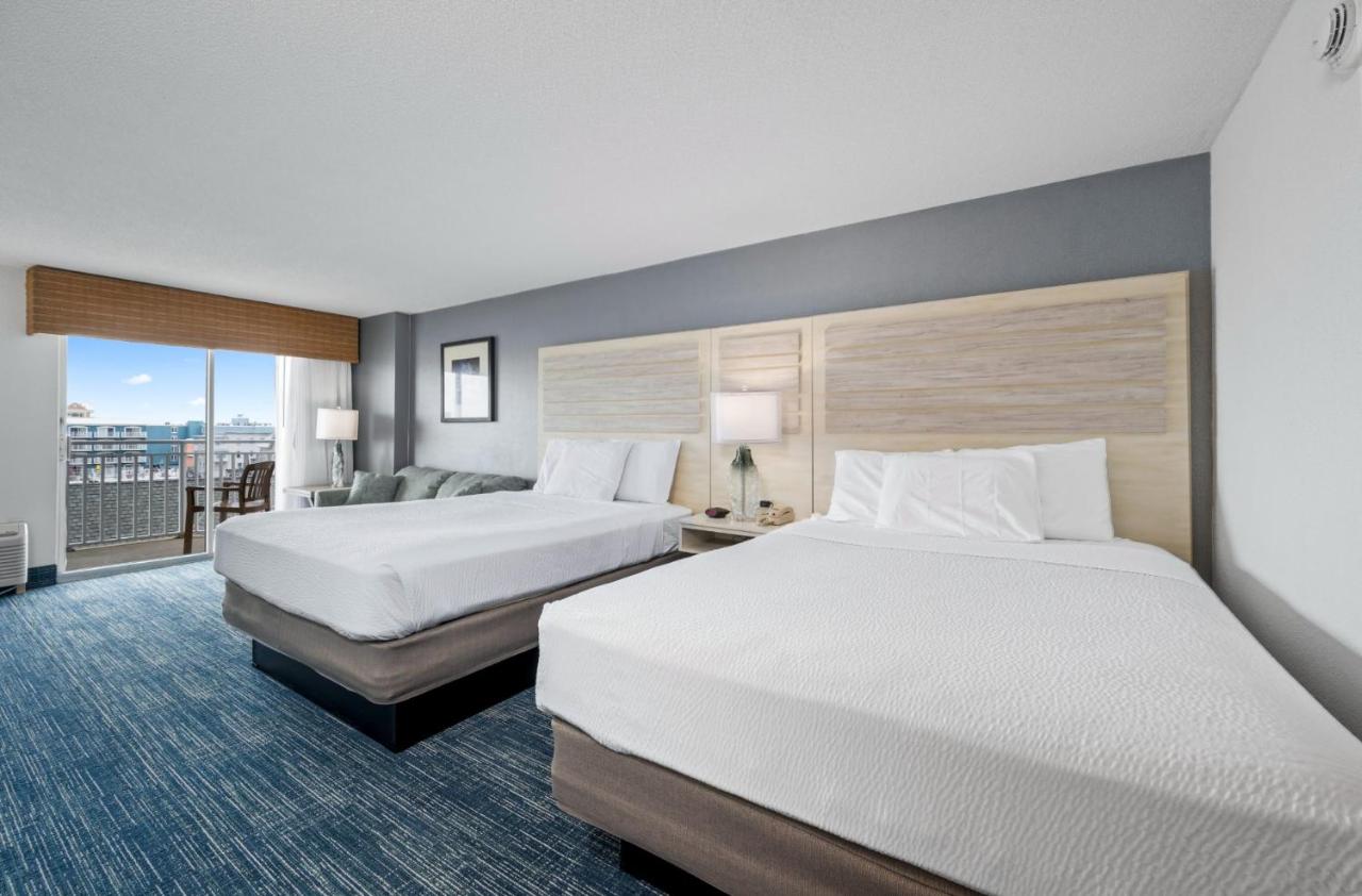 Balcony Two Queen Beds and Sofa Bed with Side Ocean View at Hotel Monte Carlo Ocean City