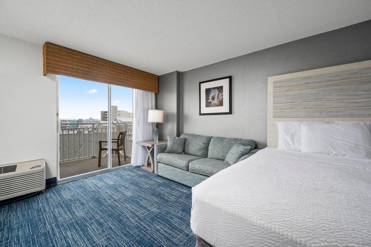 Balcony Two Queen Beds and Sofa Bed with Side Ocean View at Hotel Monte Carlo Ocean City