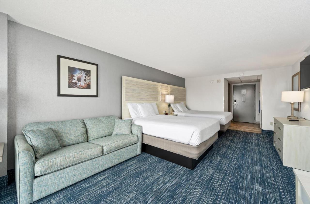 Balcony Two Queen Beds and Sofa Bed with Side Ocean View at Hotel Monte Carlo Ocean City