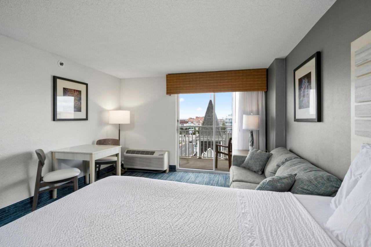 Balcony Two Queen Beds and Sofa Bed with Side Ocean View at Hotel Monte Carlo Ocean City