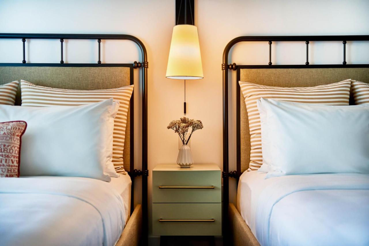 Queen Room with Two Queen Beds and Roll-in Shower - Mobility and Hearing Accessible at The Casso, Raleigh, a Tribute Portfolio Hotel