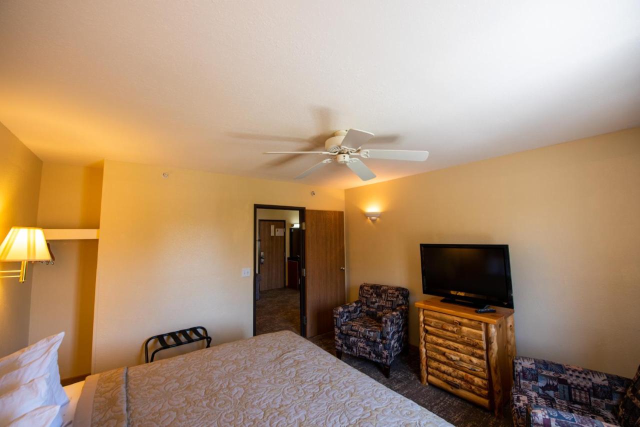 King Suite with Two King Beds - Courtside - Non-Smoking at Super 8 by Wyndham Bridgeview of Mackinaw City