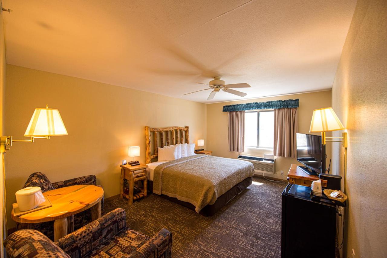 Two-Room King Suite - Courtside - Non-Smoking at Super 8 by Wyndham Bridgeview of Mackinaw City