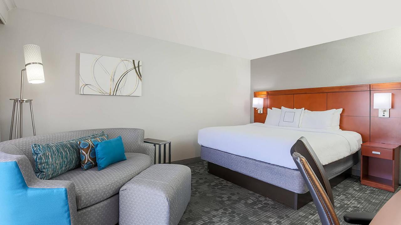 King Room with Sofa Bed and Balcony at Courtyard by Marriott Monroe Airport