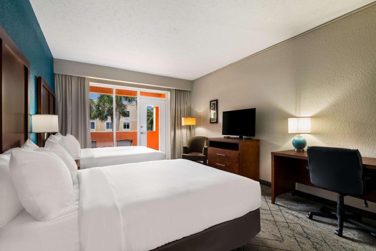 Queen Room with Two Queen Beds and Balcony at SureStay Plus Hotel by Best Western The Villages