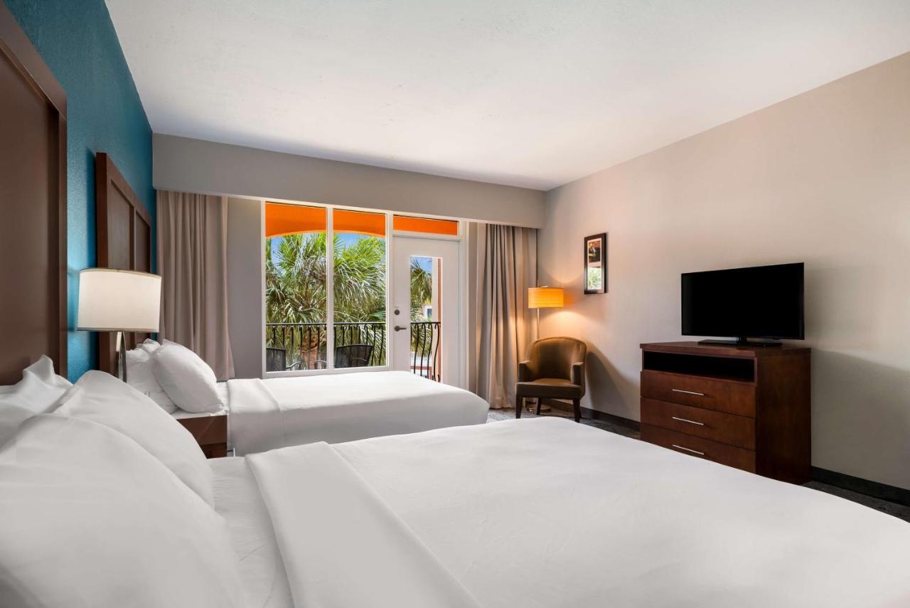 Queen Room with Two Queen Beds and Balcony at SureStay Plus Hotel by Best Western The Villages