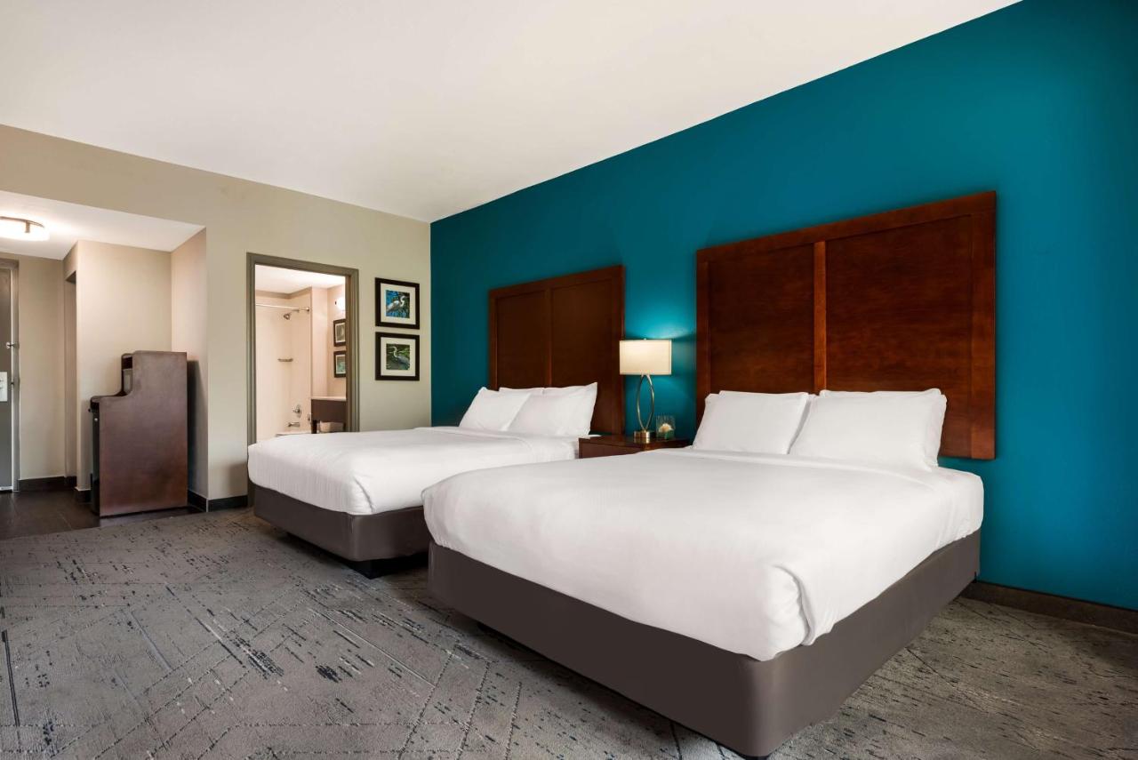 Queen Room with Two Queen Beds and Balcony at SureStay Plus Hotel by Best Western The Villages