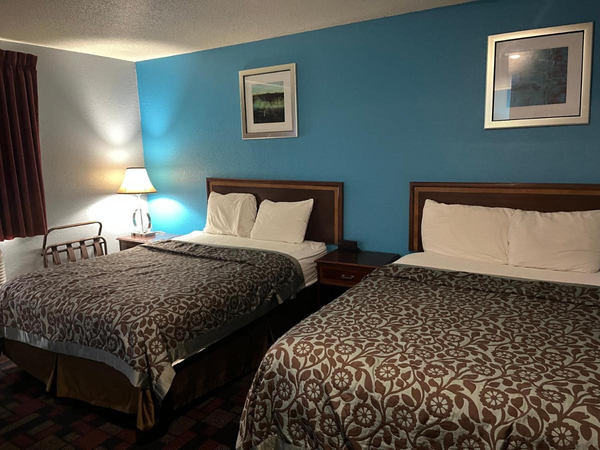 Queen Room with Two Queen Beds - Non-Smoking at Rodeway Inn