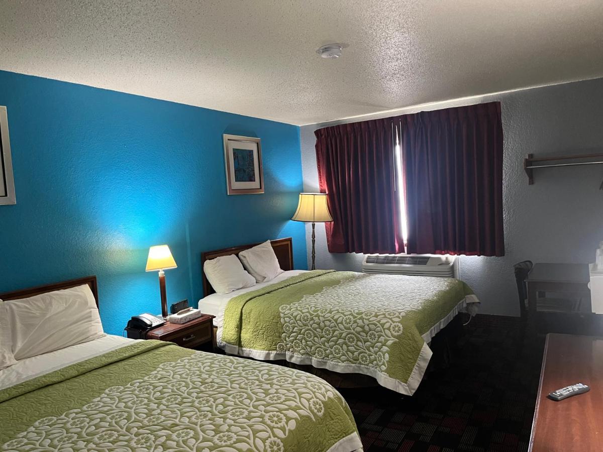 Queen Room with Two Queen Beds - Non-Smoking at Rodeway Inn
