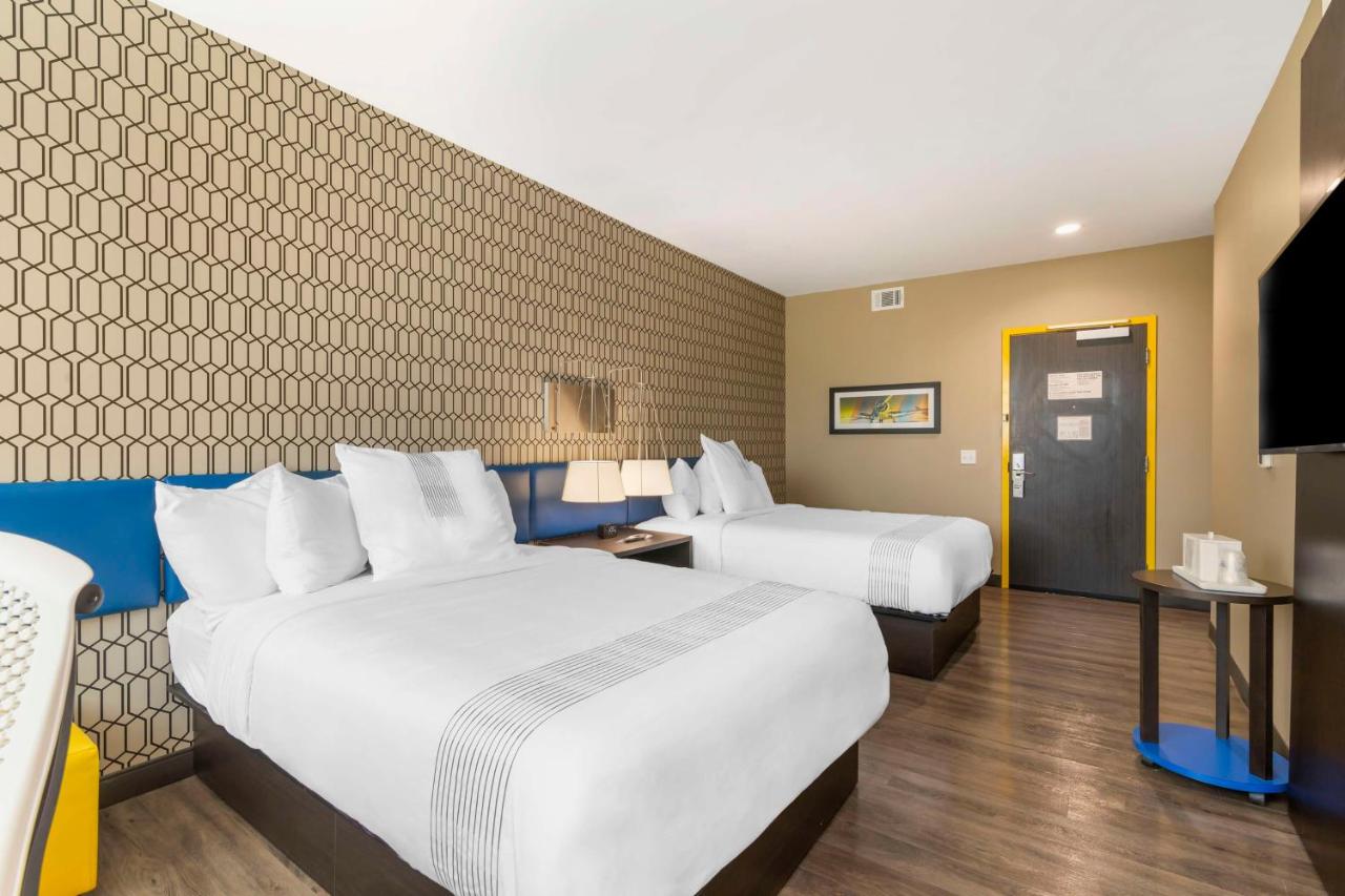 Queen Room with Two Queen Beds - Disability Access at Glō Best Western Pooler - Savannah Airport Hotel