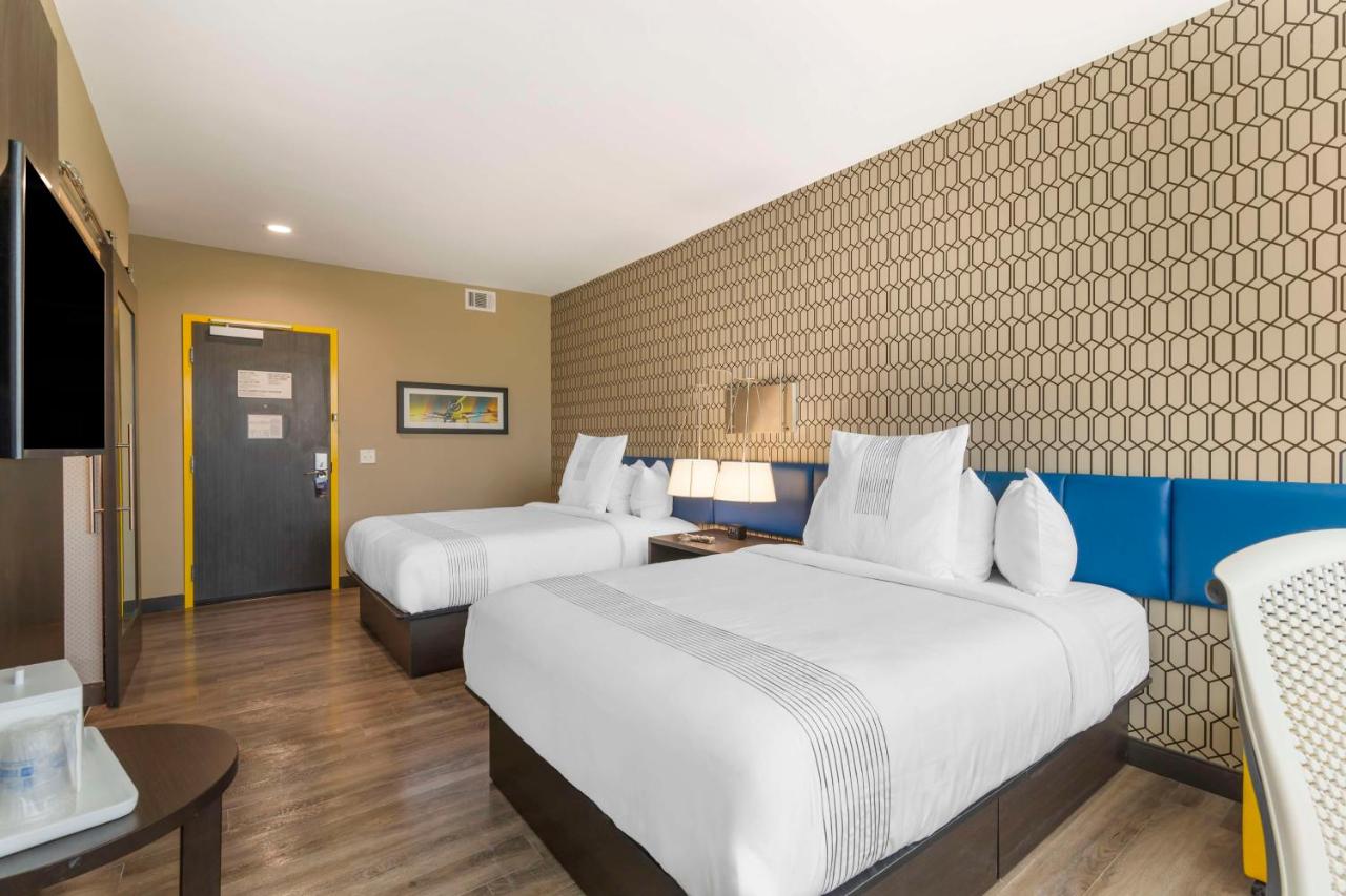 Queen Room with Two Queen Beds at Glō Best Western Pooler - Savannah Airport Hotel