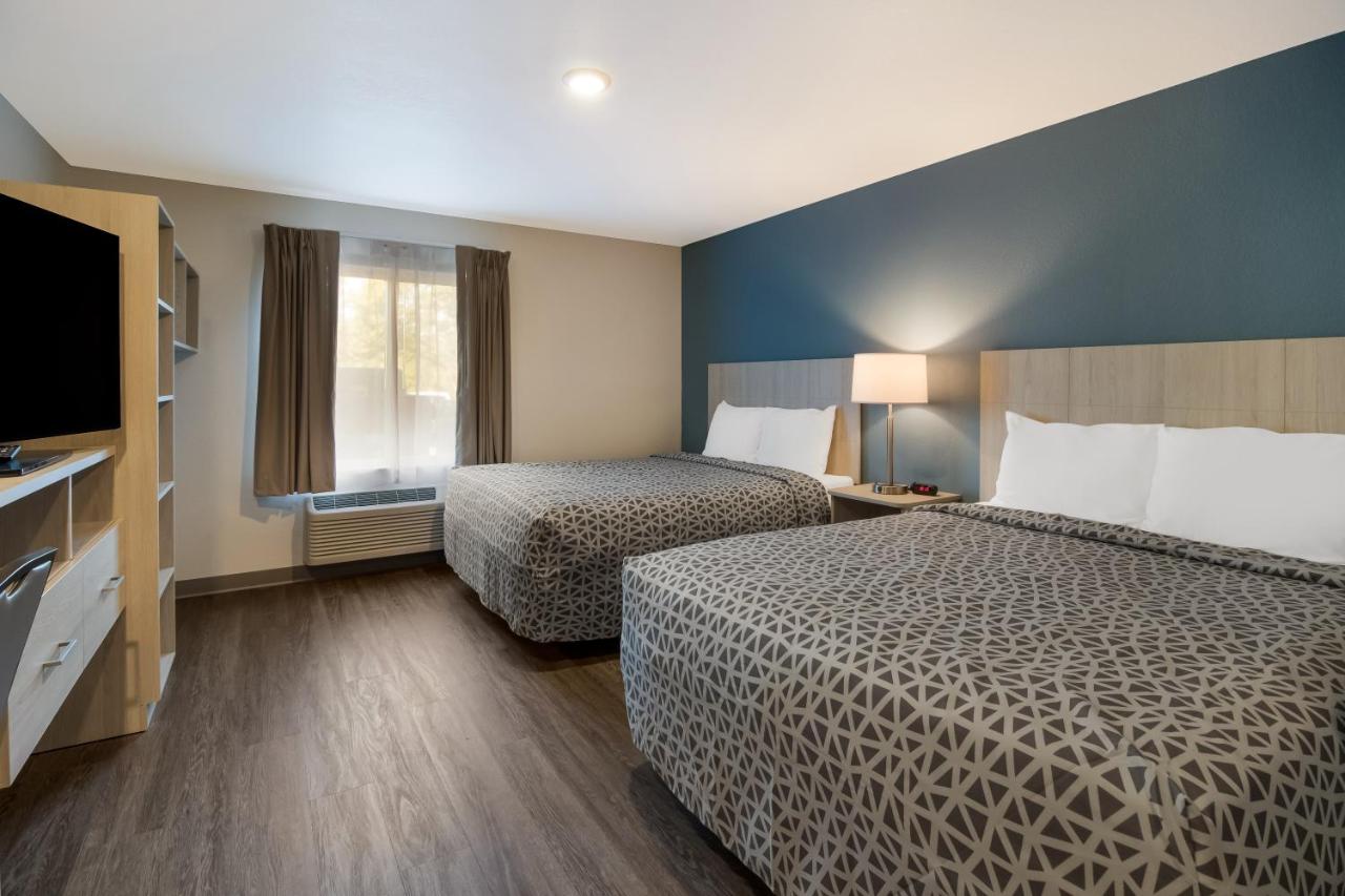 Quadruple Room with Two Queen Beds/Bathtub - Non Smoking at WoodSpring Suites Concord-Charlotte Speedway