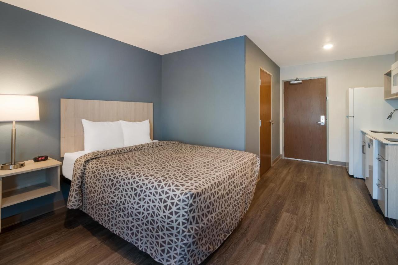 Standard Queen Room w/Overstuffed Chair - Non Smoking at WoodSpring Suites Concord-Charlotte Speedway