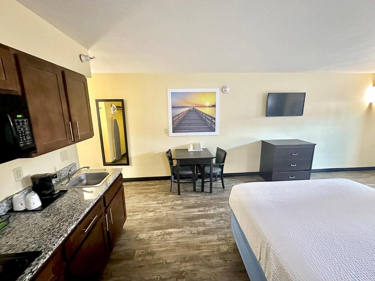 Queen Room with Two Queen Beds and Kitchenette - Non-Smoking at Days Inn by Wyndham New Orleans Pontchartrain