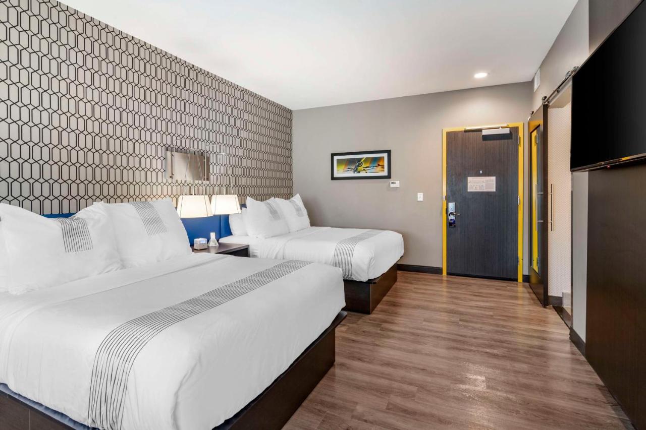 Queen Room with Two Queen Beds at GLō Best Western  Savannah-Gateway I-95