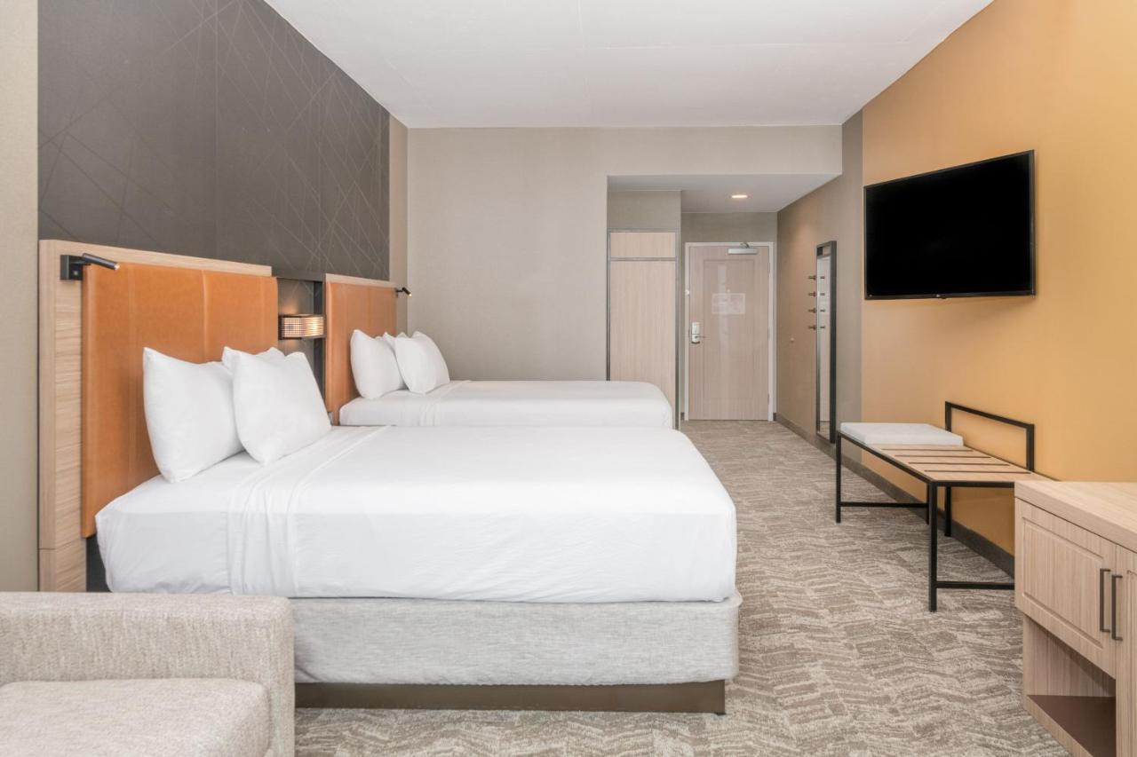 Queen Suite with Two Queen Beds and Sofa Bed at SpringHill Suites by Marriott Baltimore Downtown Convention Center Area
