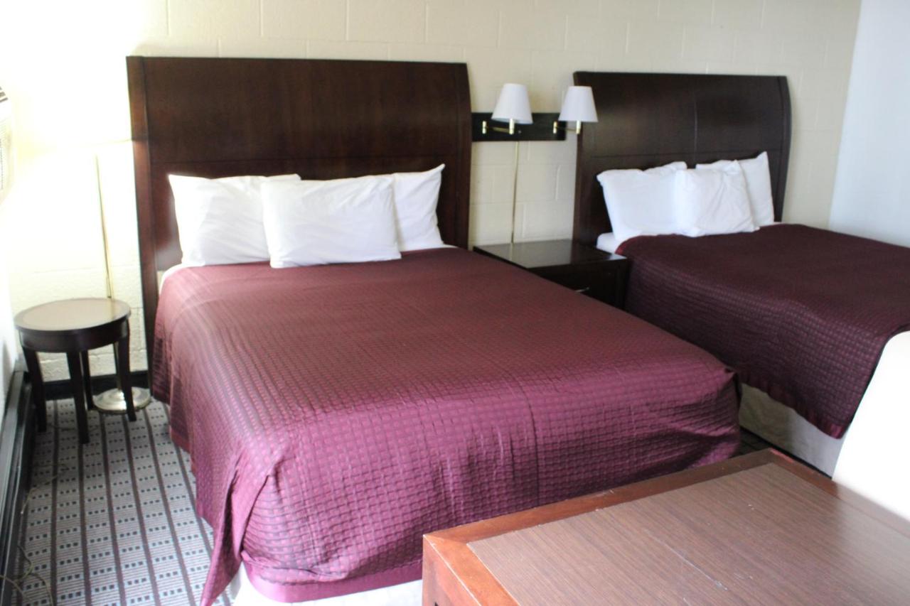 Queen Room with Two Queen Beds at Aero Inn