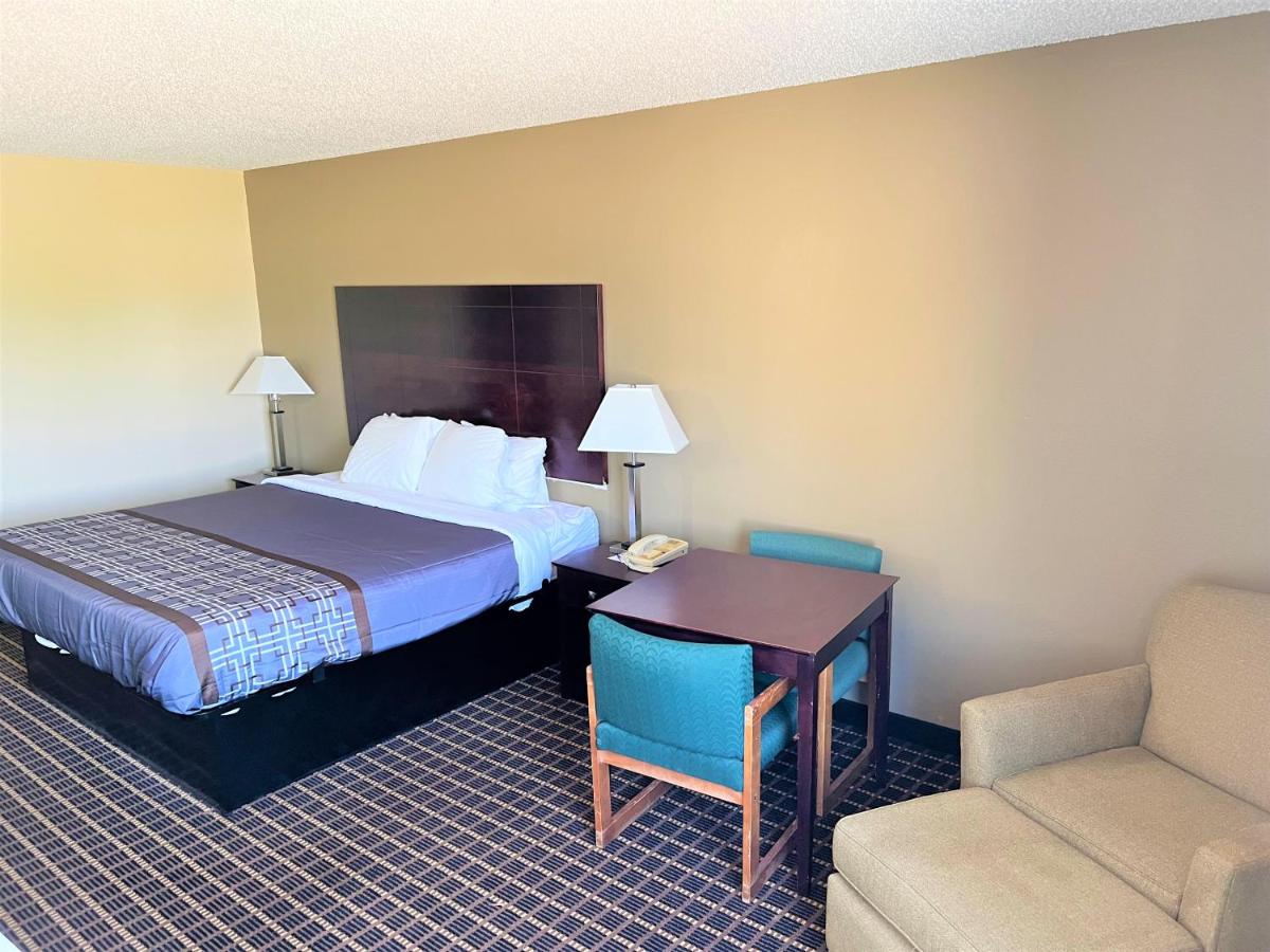 | Designer Inn and Suites