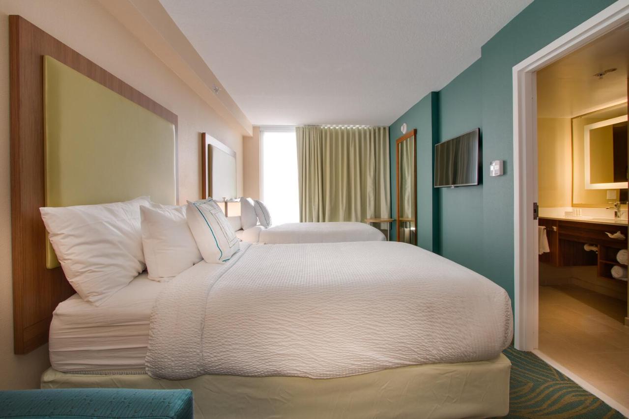 Suite with Two Double Beds and Sofa Bed at SpringHill Suites by Marriott Orlando Lake Buena Vista South