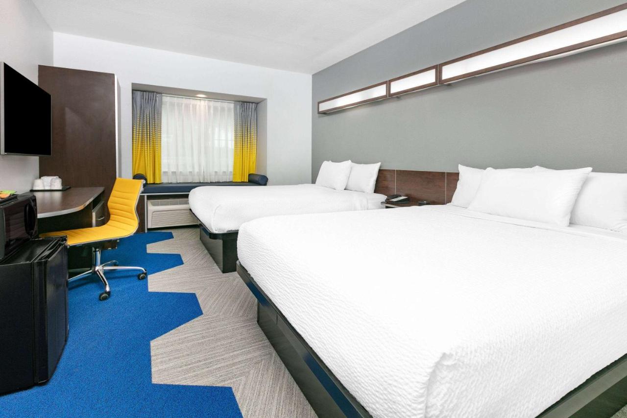Queen Room with Two Queen Beds - Non-Smoking at Microtel Inn & Suites by Wyndham Austin Airport