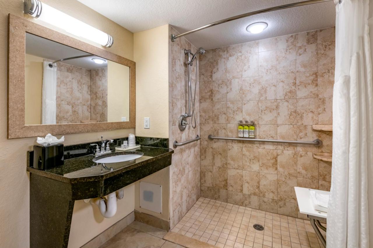 Deluxe Queen Room with Two Queen Beds and Roll-In Shower at Holiday Inn Resort Orlando - Lake Buena Vista by IHG
