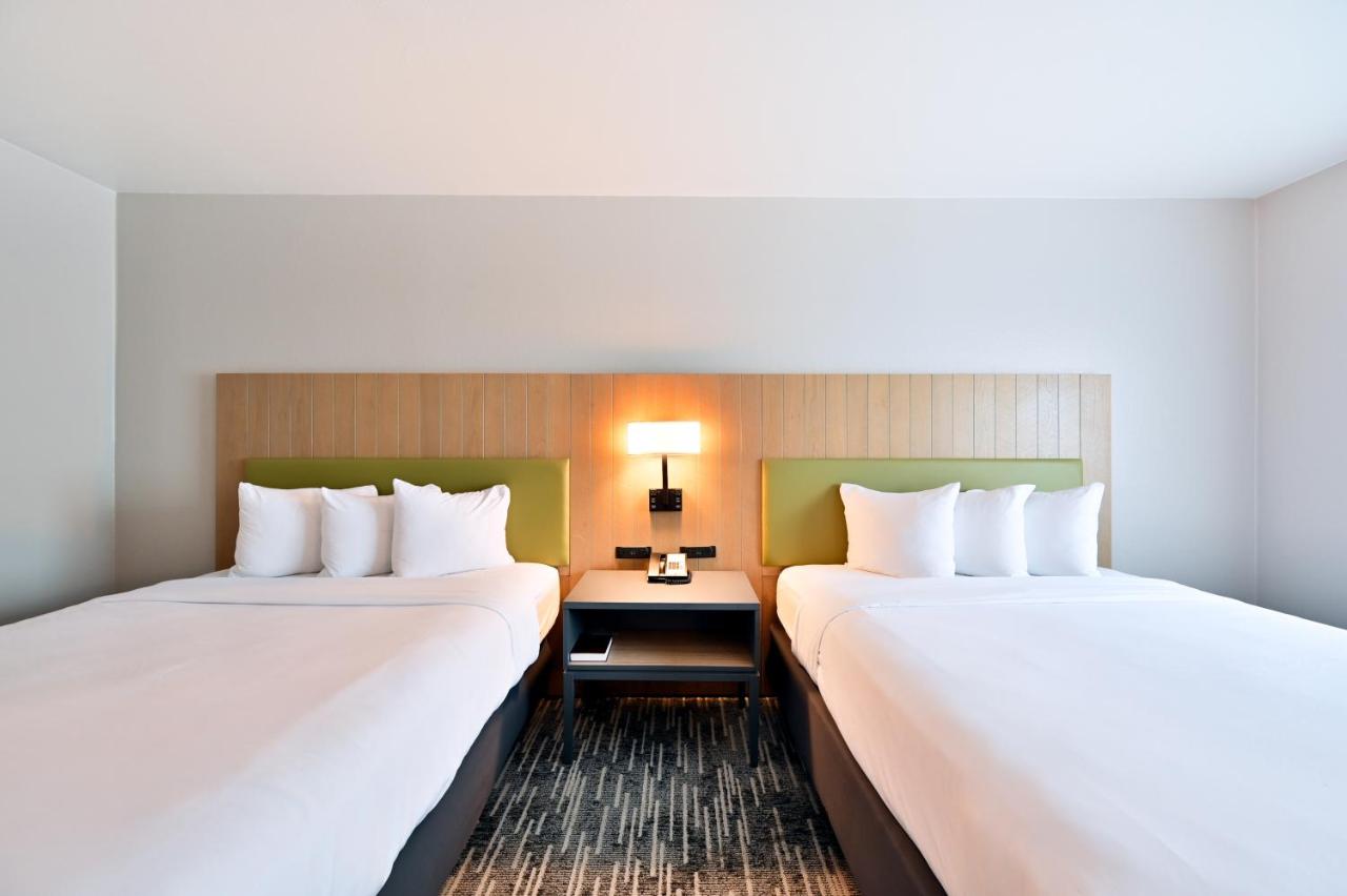 Queen Room with Two Queen Beds at Country Inn & Suites by Radisson, Bloomington-Normal Airport, IL
