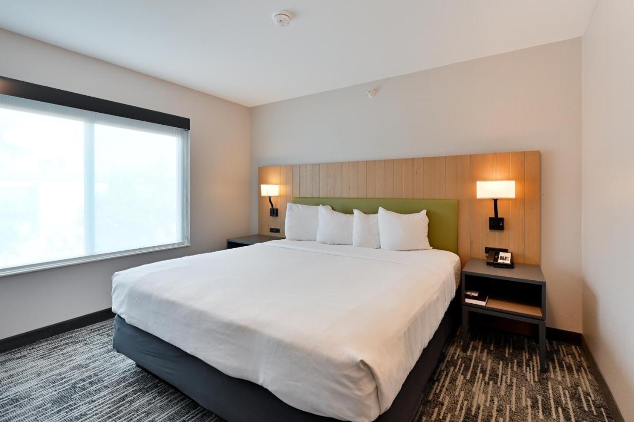 One-Bedroom King Suite with Sofa Bed - Disability Access at Country Inn & Suites by Radisson, Bloomington-Normal Airport, IL