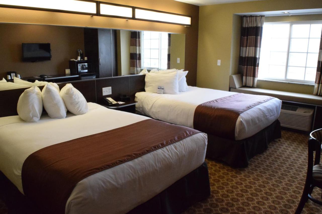 Queen Room with Two Queen Beds - Non-Smoking at Microtel Inn & Suites By Wyndham Pecos