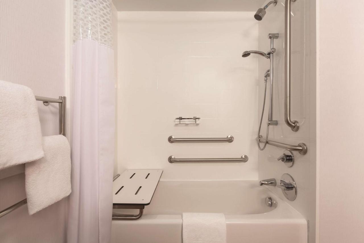 Full Size Bed and Bath Tub - Disability Access at Hampton Inn Des Moines-Airport