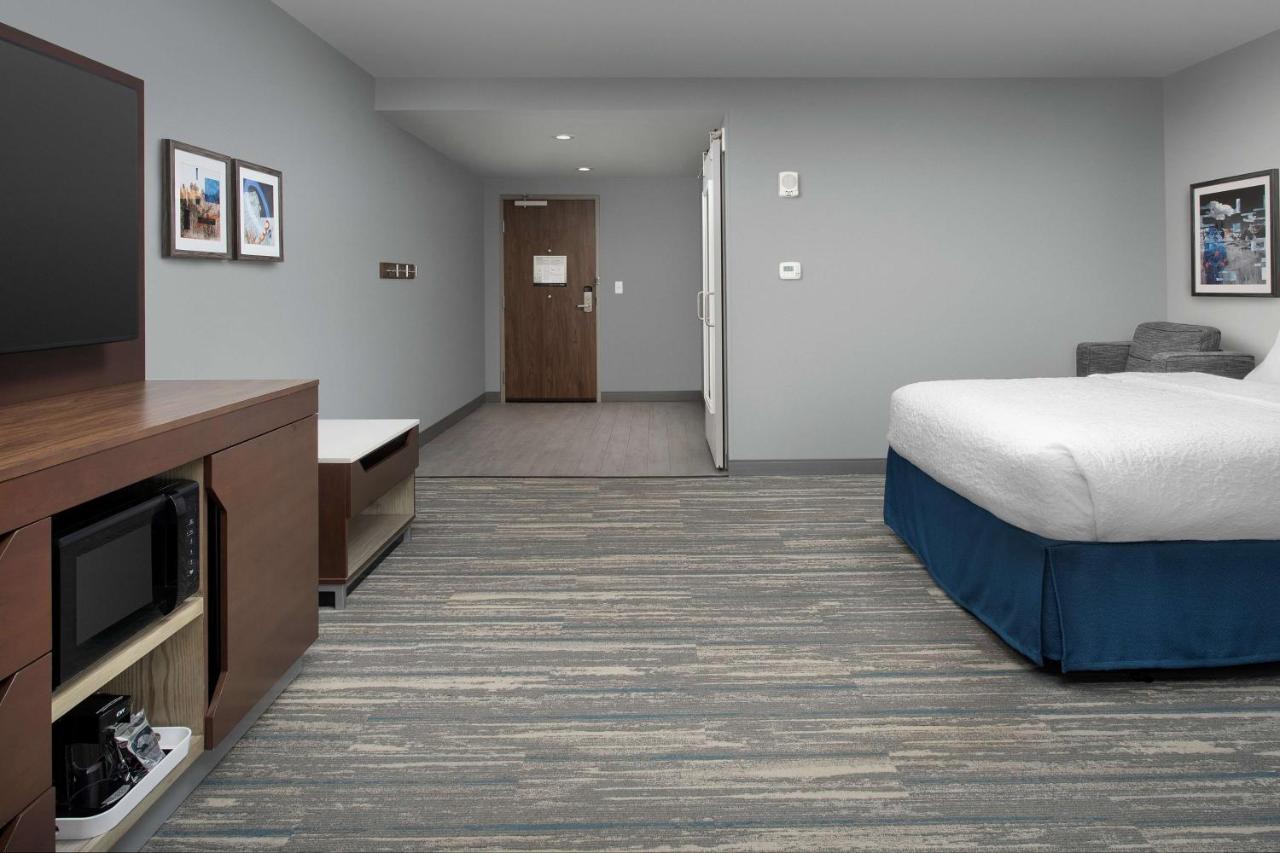 Queen Room with Two Queen Beds - Mobility Accessible with Roll-in Shower at Hampton Inn & Suites Rapid City Rushmore